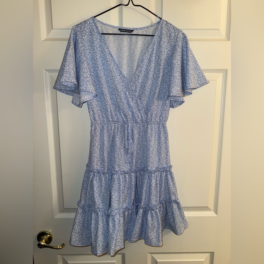 Light blue with white flowers Sheen dress with front bow size extra small